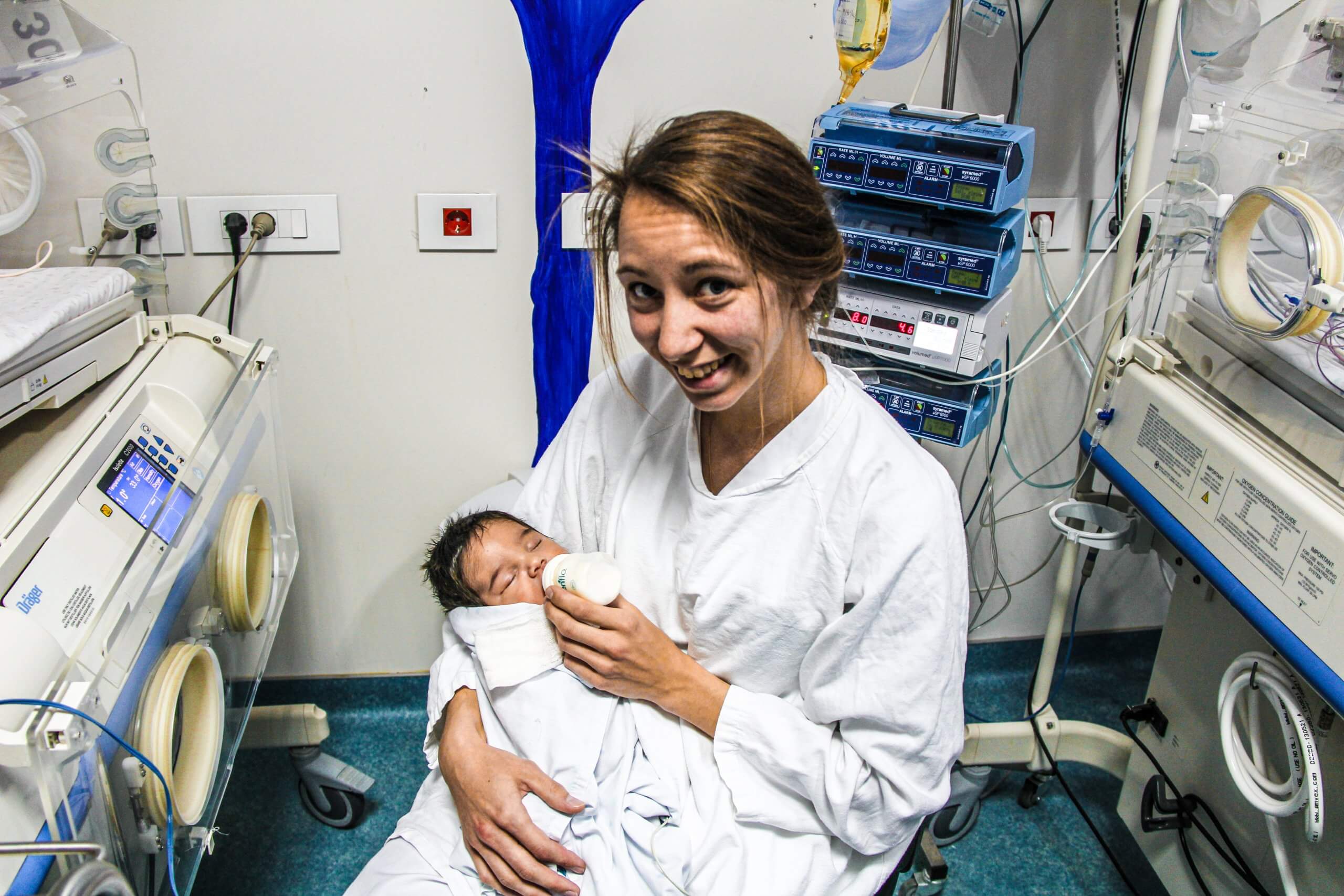 Two volunteer nurses help the pediatric emergency department of the Quarantine Hospital in Beirut