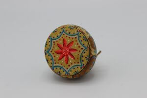 Toupie motifs rouges et bleus